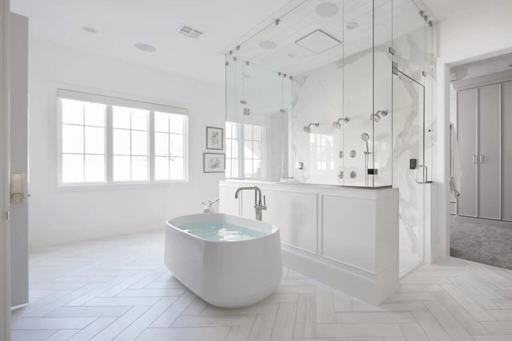 modern bathroom with shower panel and bathtub
